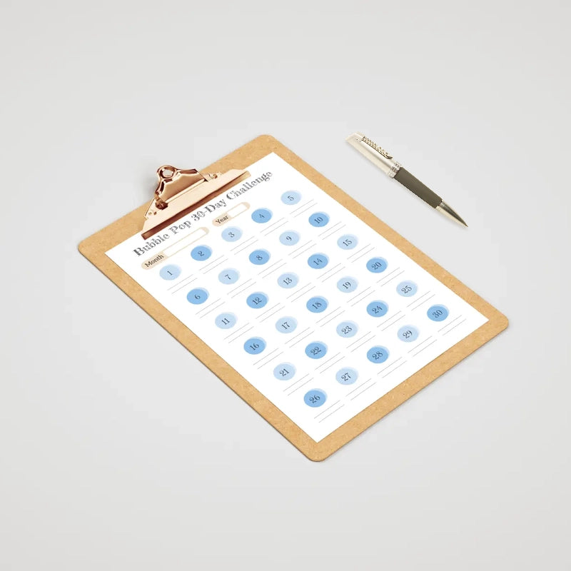 Mockup presenting an example of use for the blue tones version of the Bubble Pop 30-Day Challenge printable template with its circle pattern.