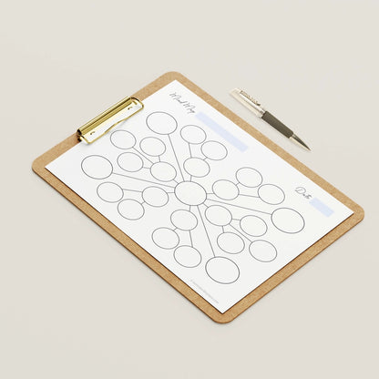 Mockup example of the black and white Starburst Mind Map Template printable.